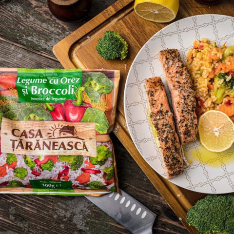 Baked salmon with a side dish of vegetables with rice and broccoli
